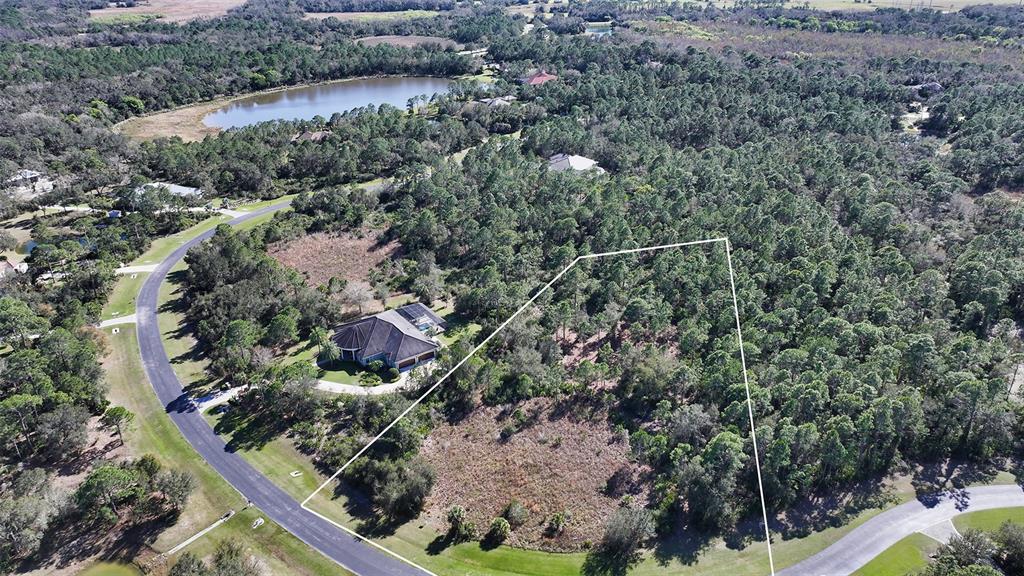 10709 Leafwing Drive Sarasota, FL 34241 - Photo 6 of 27 an aerial view of house with a yard