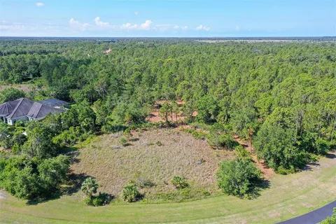 a view of a yard with an outdoor space and seating area
