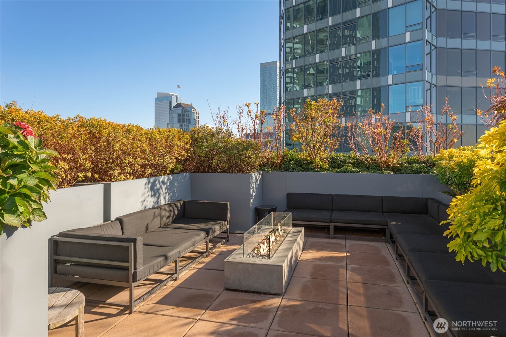 2033 2nd Avenue, Unit 1608 Seattle, WA 98121 - Photo 31 of 33 a terrace view with sitting space and garden view