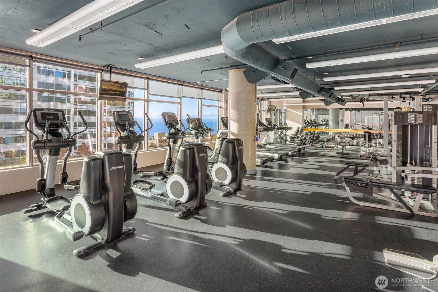 2033 2nd Avenue, Unit 1608 Seattle, WA 98121 - Photo 32 of 33 a view of a room with gym equipment