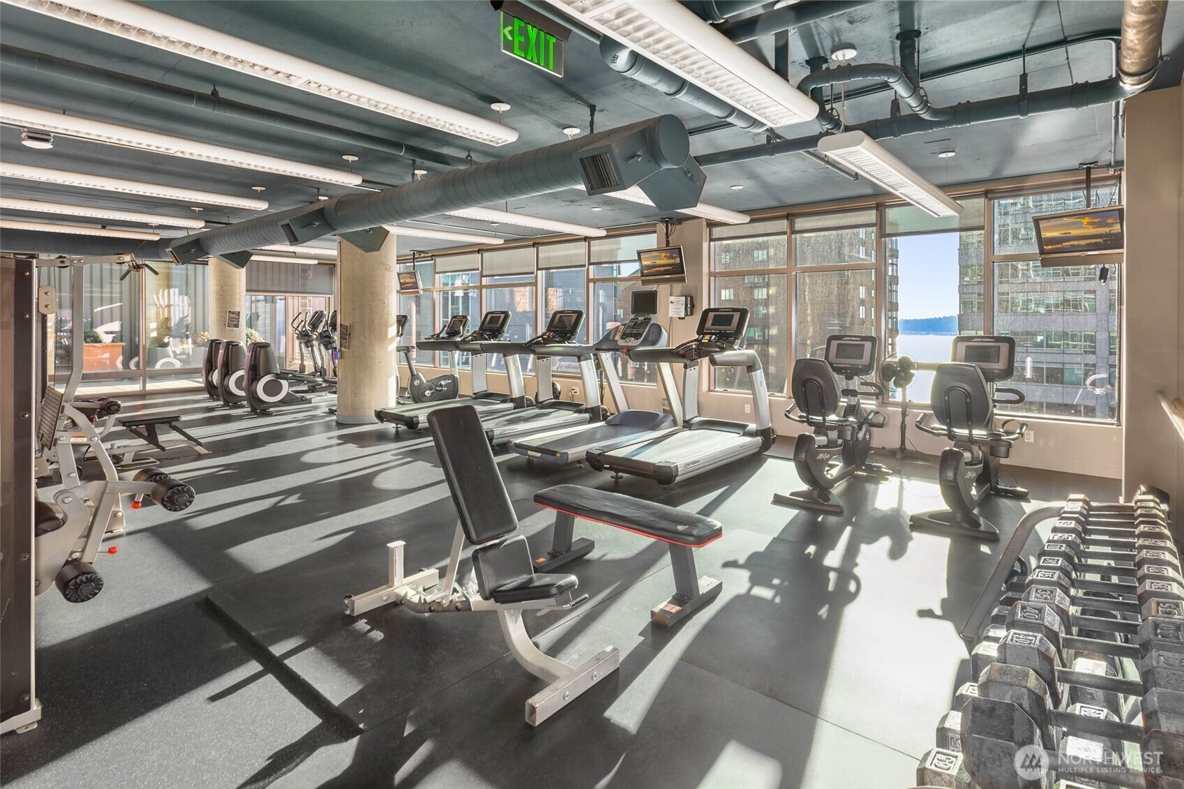 2033 2nd Avenue, Unit 1608 Seattle, WA 98121 - Photo 33 of 33 a view of a patio with table and chairs