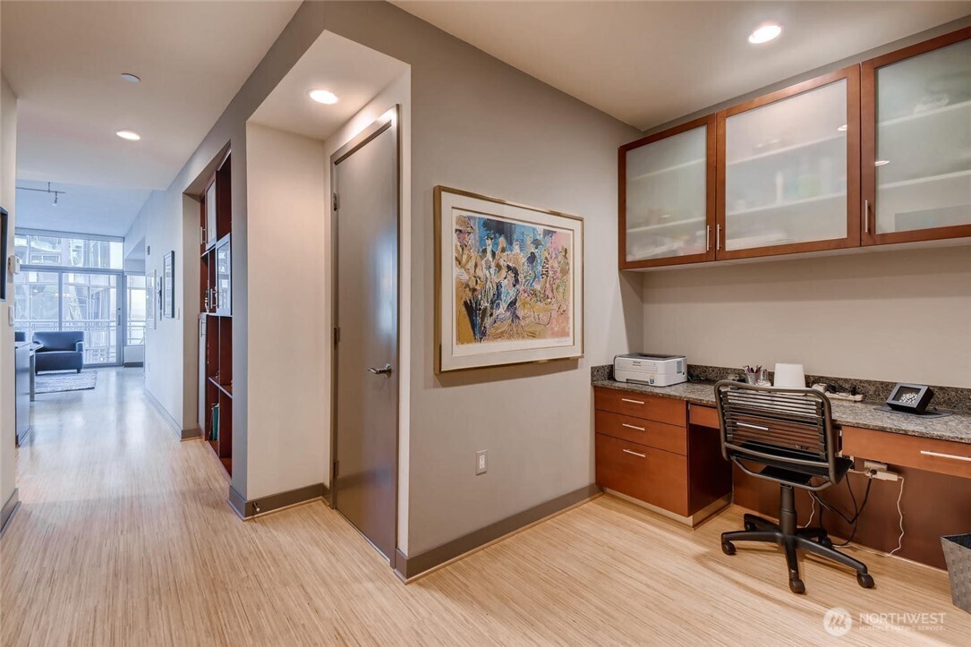 2033 2nd Avenue, Unit 1608 Seattle, WA 98121 - Photo 9 of 33 a view of a workspace with furniture and a window