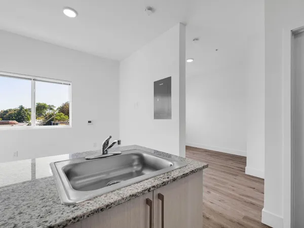 a close view of a sink and a vanity in the bathroom