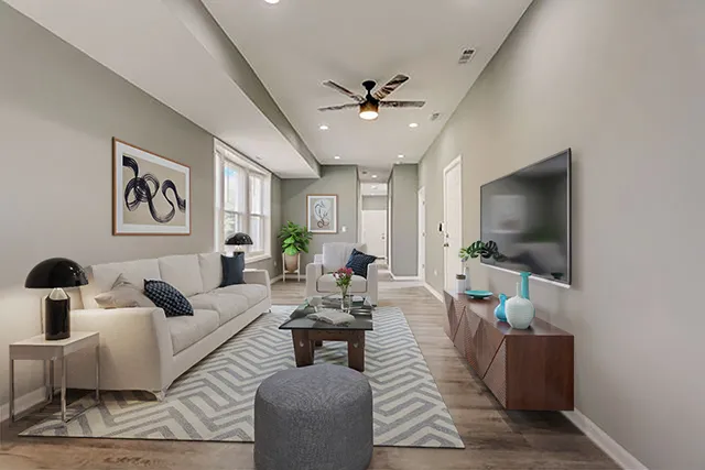 a living room with furniture and a flat screen tv