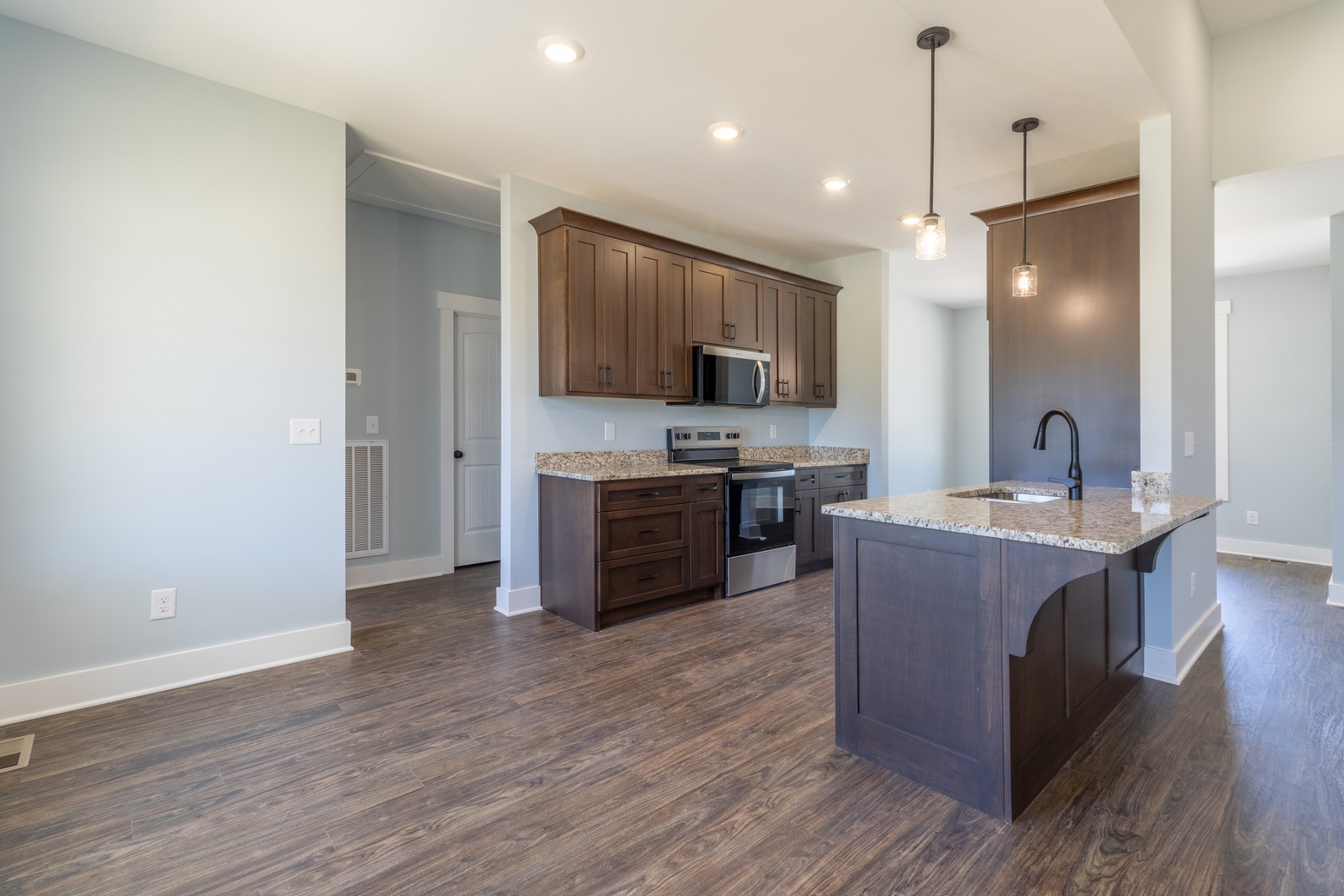 2060 Beverly Court Springfield, TN 37172 - Photo 18 of 33 a kitchen with kitchen island a sink stainless steel appliances and cabinets