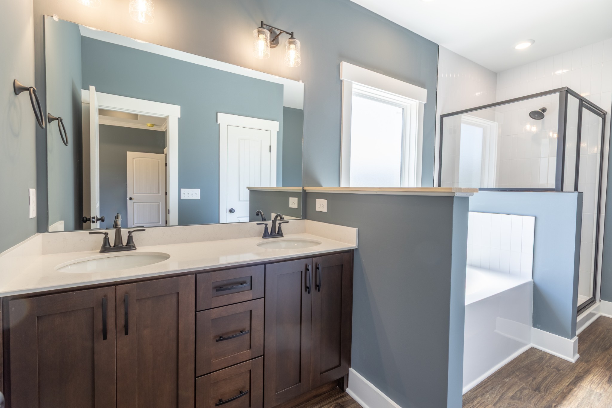 2060 Beverly Court Springfield, TN 37172 - Photo 21 of 33 a bathroom with a double vanity sink and mirror