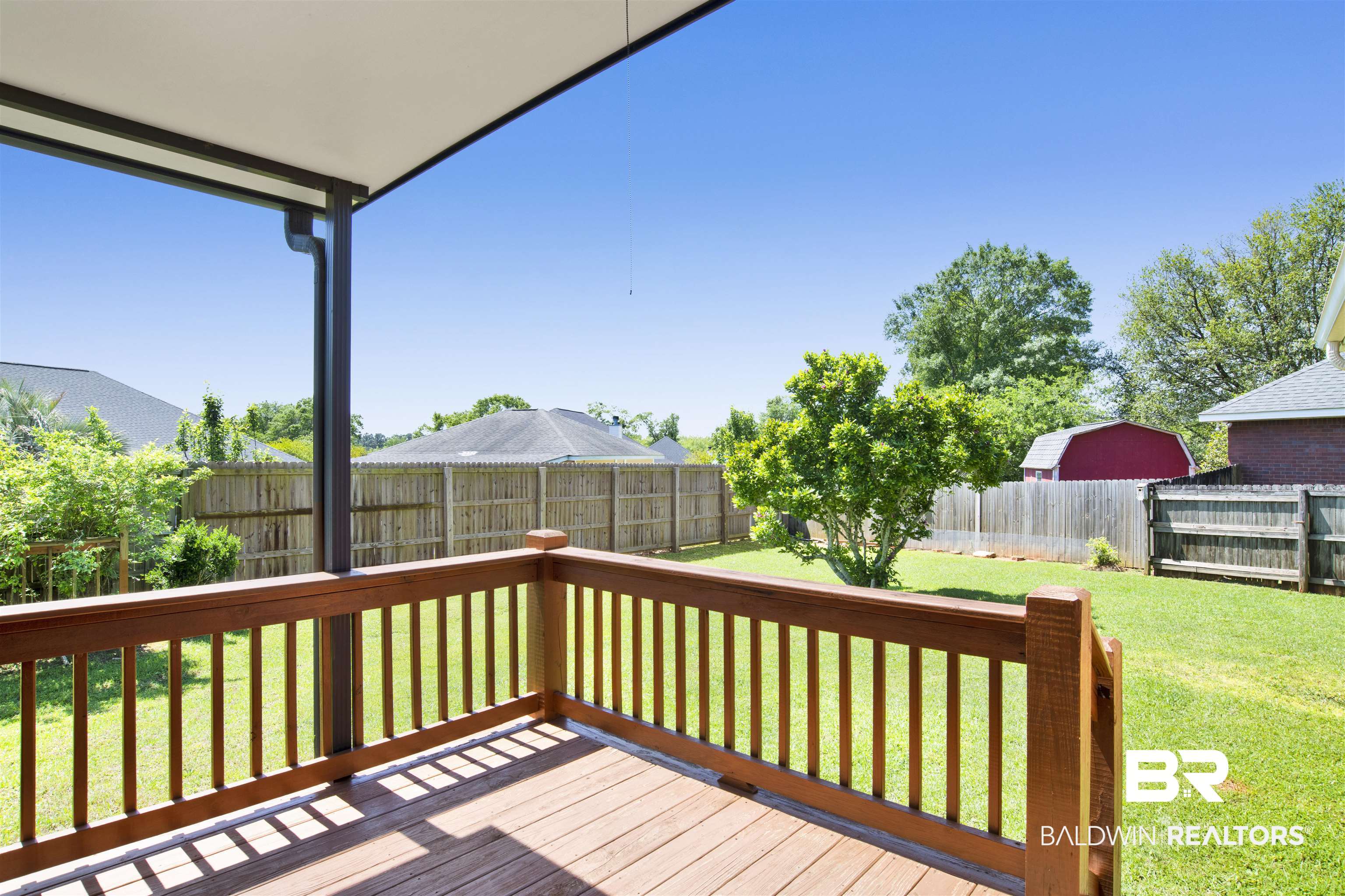 16102 Masada Court Loxley, AL 36551 - Photo 11 of 35 Deck with a yard and a fenced backyard