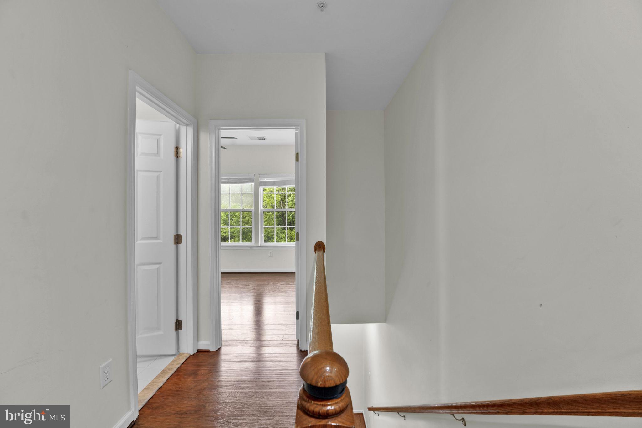 7138 Station House Road Elkridge, MD 21075 - Photo 12 of 42 a view of entryway with wooden floor