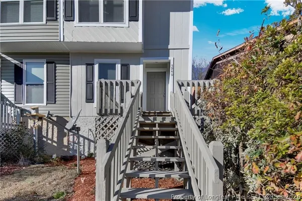 a view of entryway with a front door