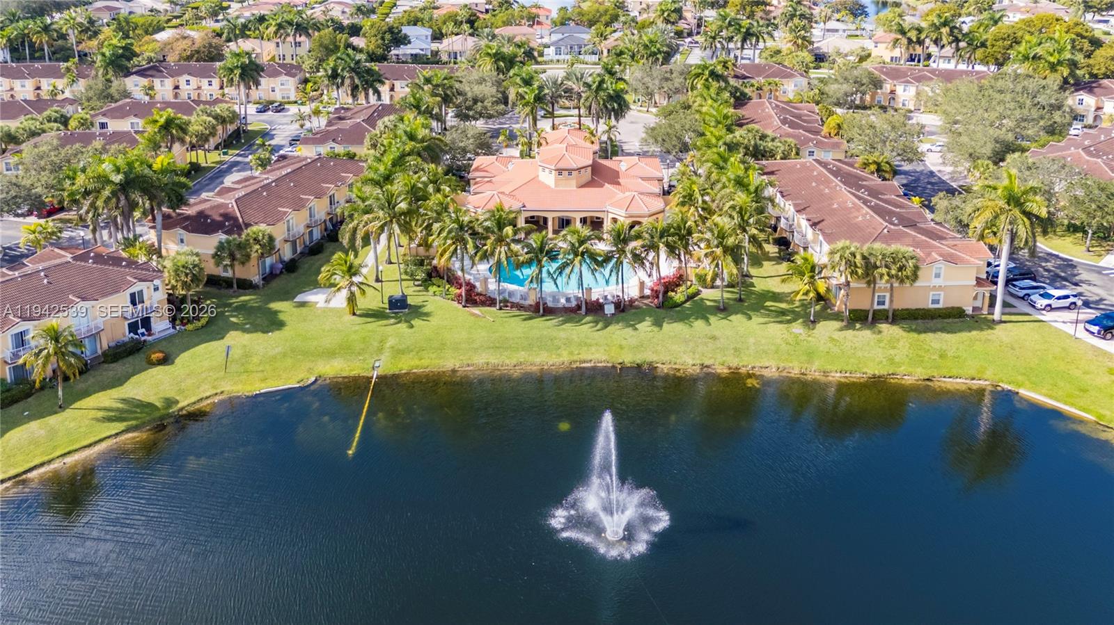 3186 Southwest 129th Terrace, Unit 113 Miramar, FL 33027 - Photo 24 of 29 an aerial view of a house with yard swimming pool and outdoor seating