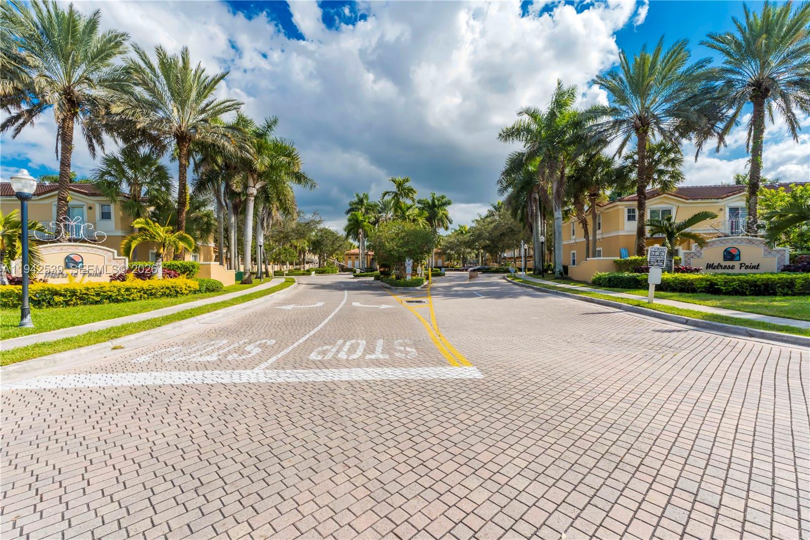 3186 Southwest 129th Terrace, Unit 113 Miramar, FL 33027 - Photo 28 of 29 a view of a yard with palm trees