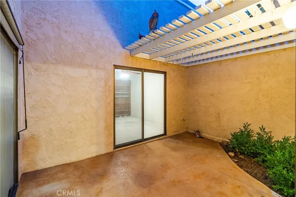 a view of a elevator with wooden floor