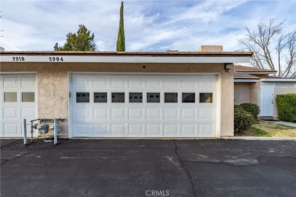 a view of a house with a patio
