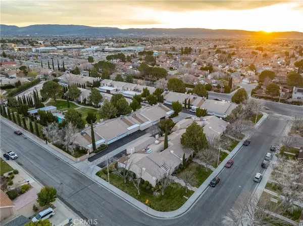 an aerial view of a house with a garden