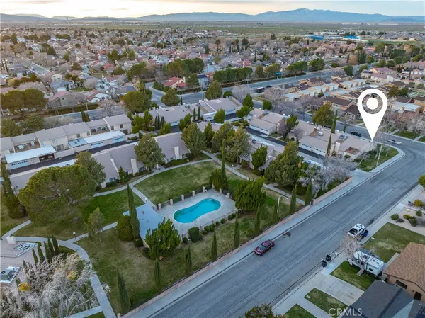 an aerial view of residential building and lake view