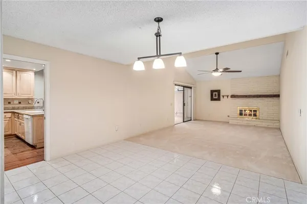 a view of a kitchen with a sink and a stove top oven
