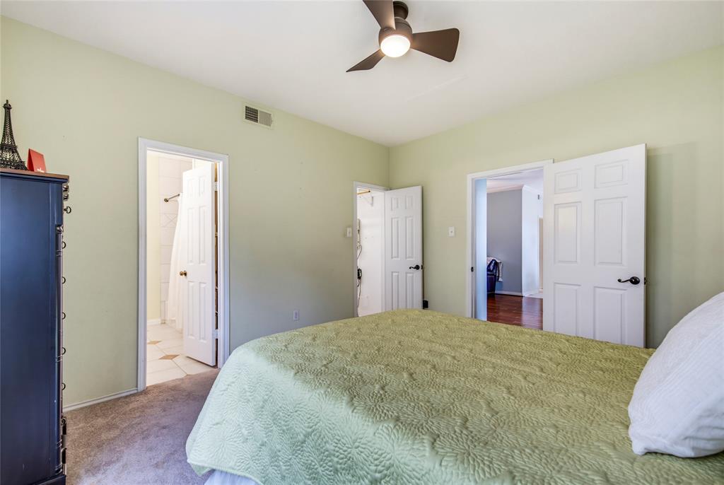 2835 Keller Springs Road, Unit 101 Carrollton, TX 75006 - Photo 16 of 22 Separate from the rest of the living space....the primary is tucked away off the living room....away from the 2nd bedroom on the other side of the unit....