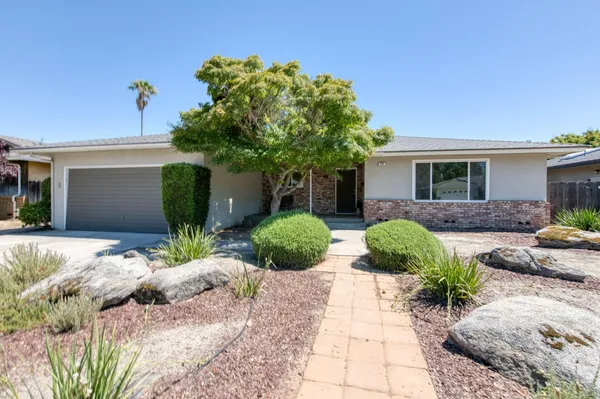 a view of a house with a patio