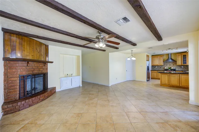 a view of a livingroom with a fireplace