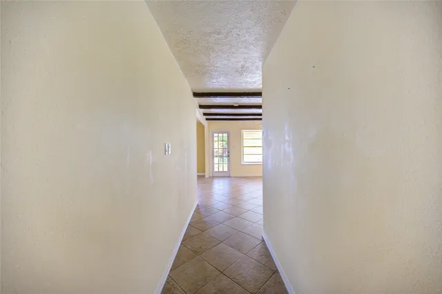 a view of hallway with stairs