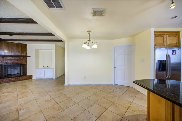 a view of a livingroom with a fireplace