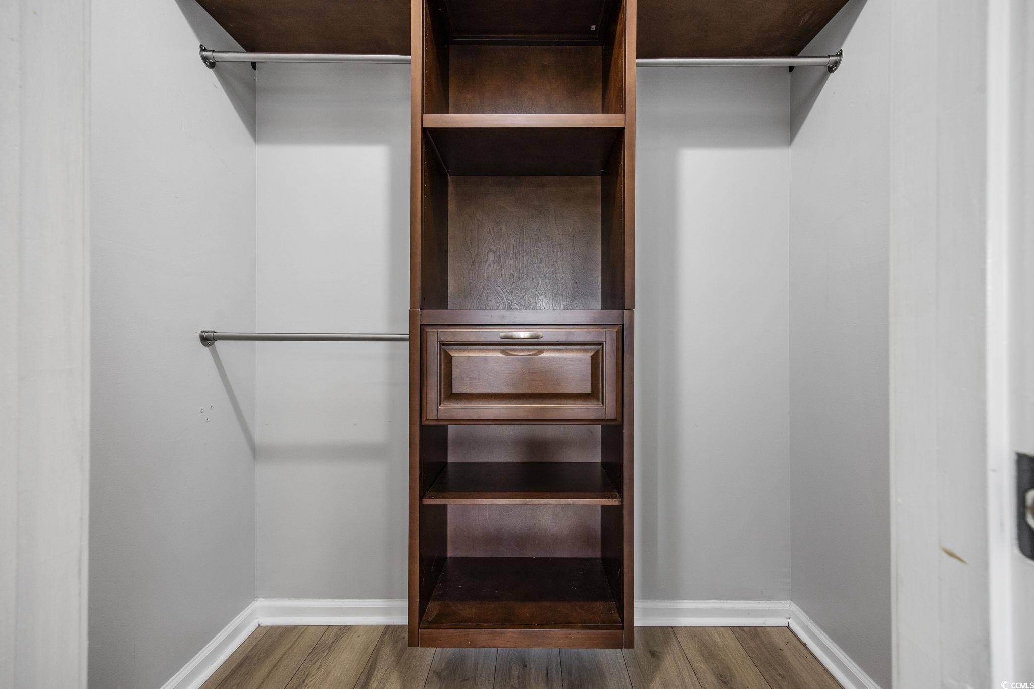 118 Sly Fox Trail Myrtle Beach, SC 29588 - Photo 19 of 40 Spacious closet featuring dark wood finished floors