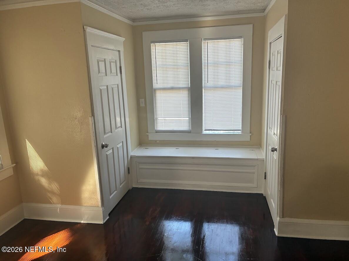 2036 Moncrief Road Jacksonville, FL 32209 - Photo 14 of 32 a view of entryway with wooden floor and door