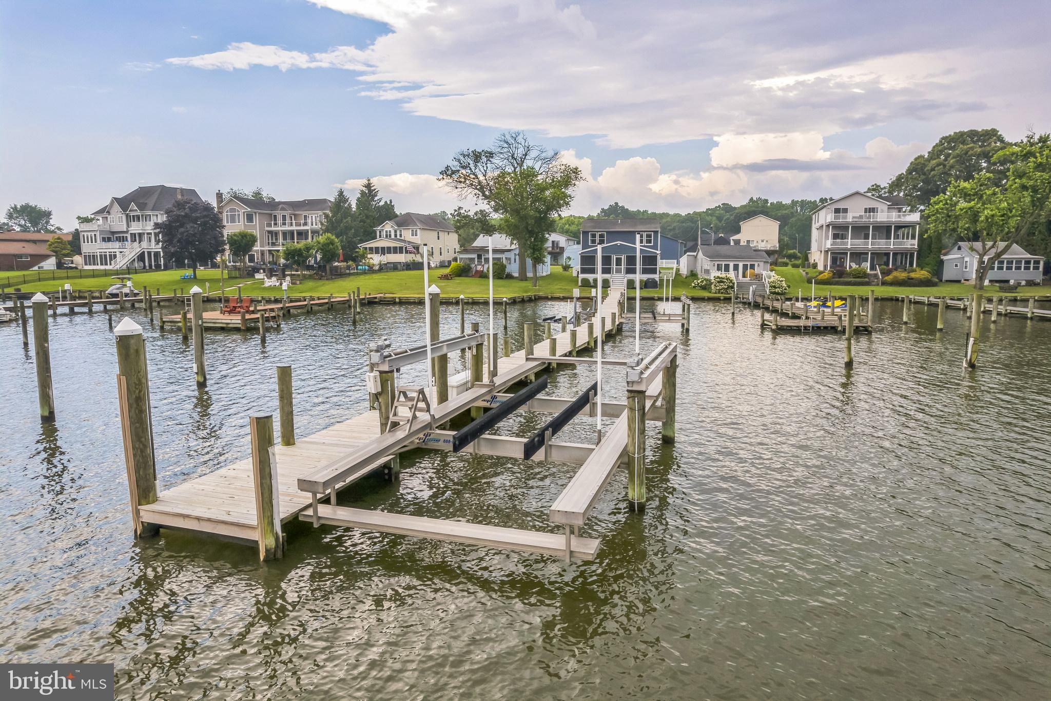 4012 Chestnut Road Baltimore, MD 21220 - Photo 15 of 58 a view of a lake with houses