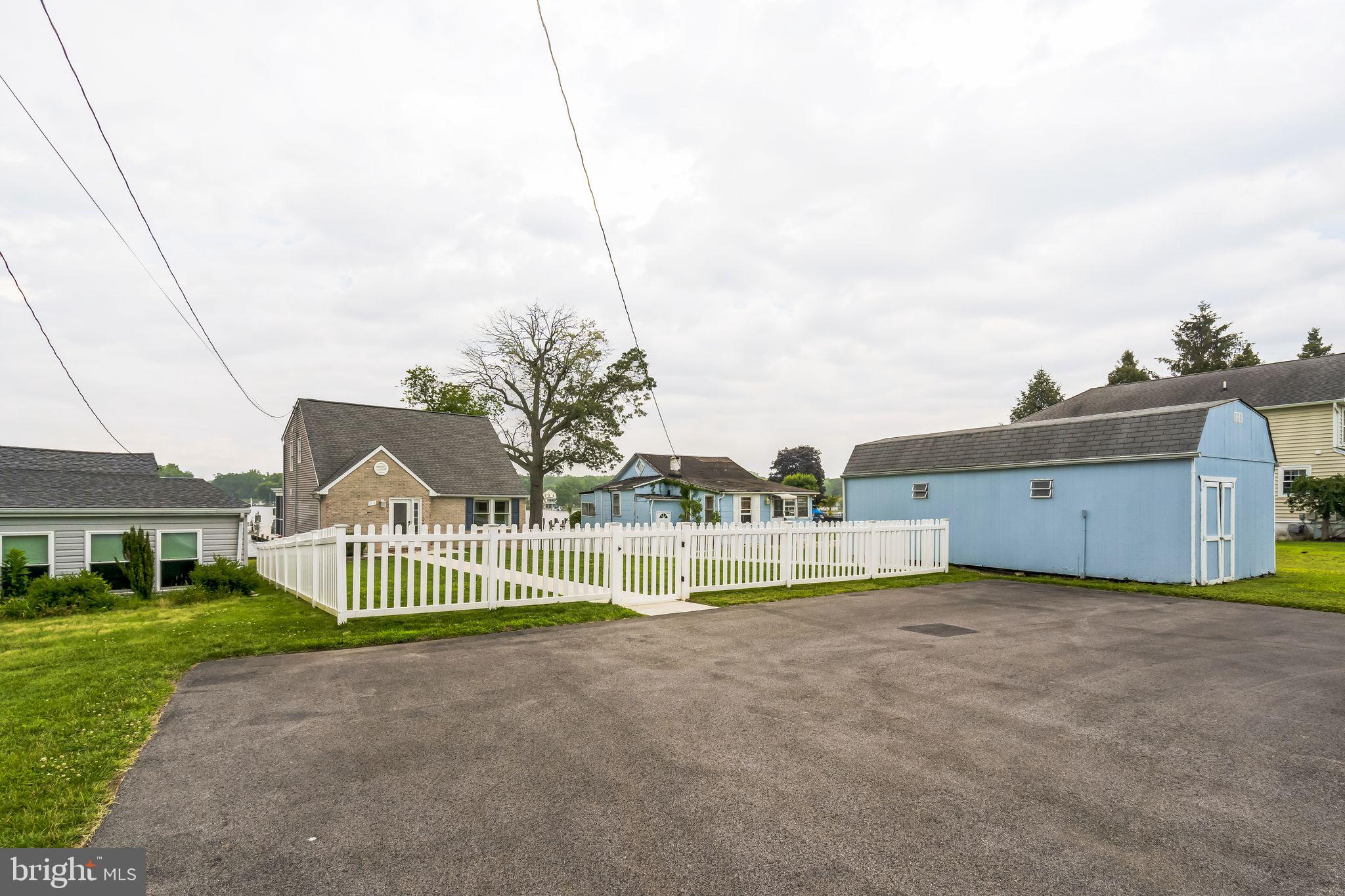 4012 Chestnut Road Baltimore, MD 21220 - Photo 23 of 58 a view of a house with a yard