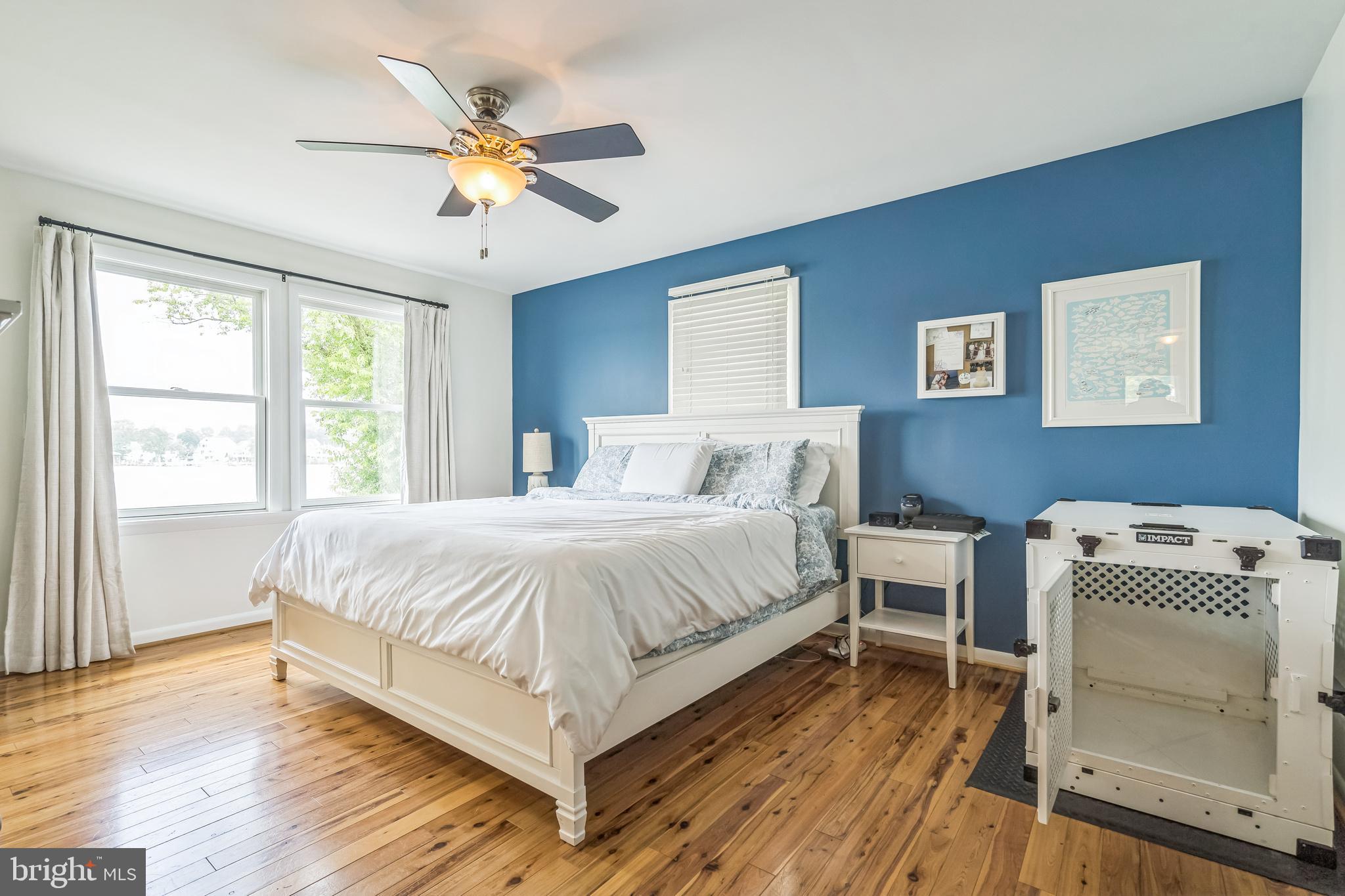 4012 Chestnut Road Baltimore, MD 21220 - Photo 44 of 58 a bedroom with a bed and a ceiling fan