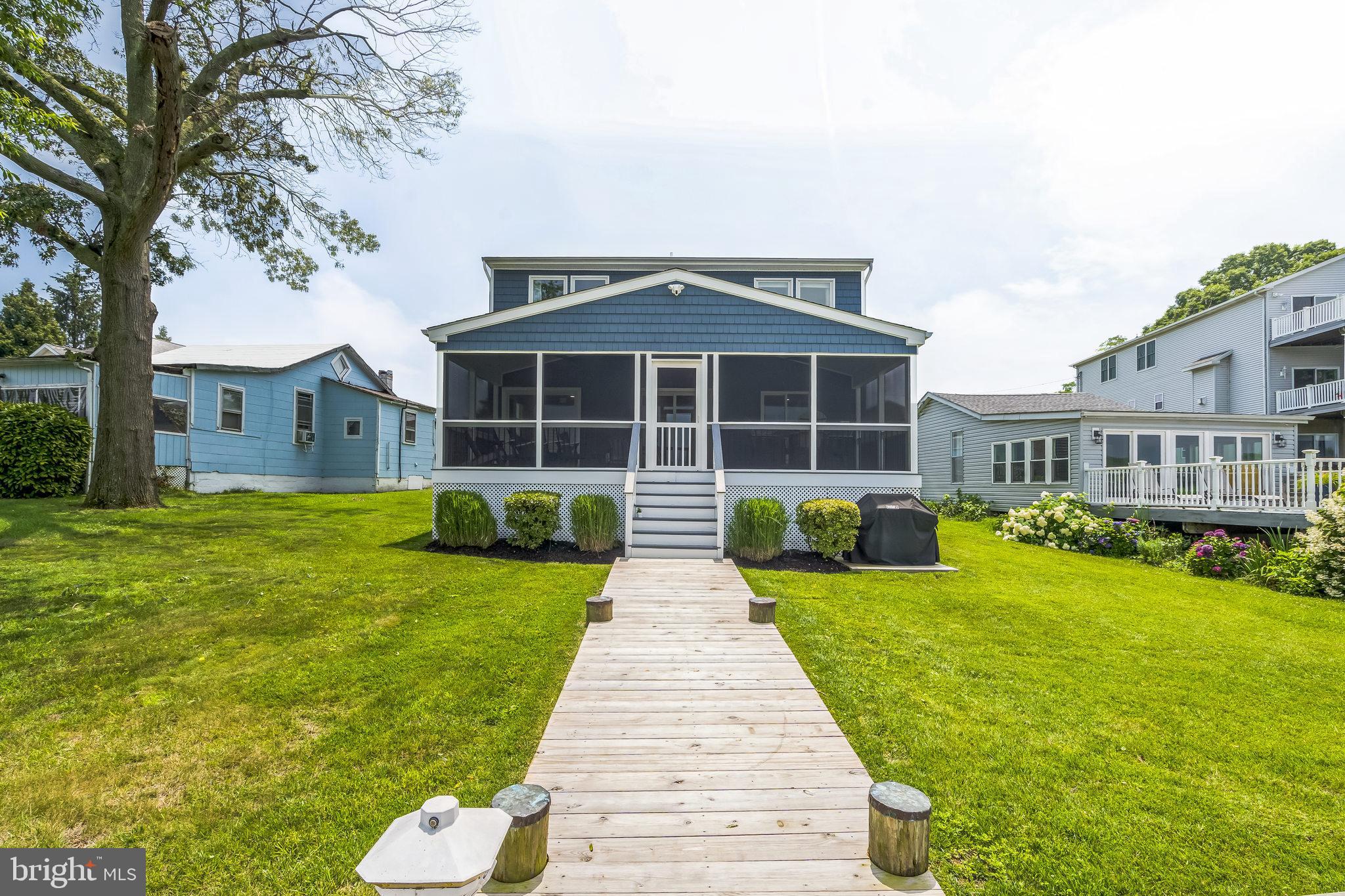 4012 Chestnut Road Baltimore, MD 21220 - Photo 6 of 58 a front view of a house with garden