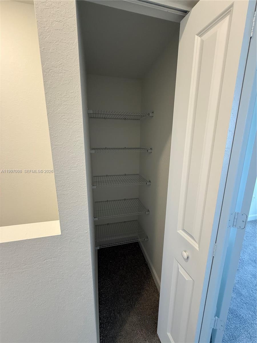 17907 Southwest 356th Street, Unit 17907 Homestead, FL 33034 - Photo 12 of 14 a view of closet