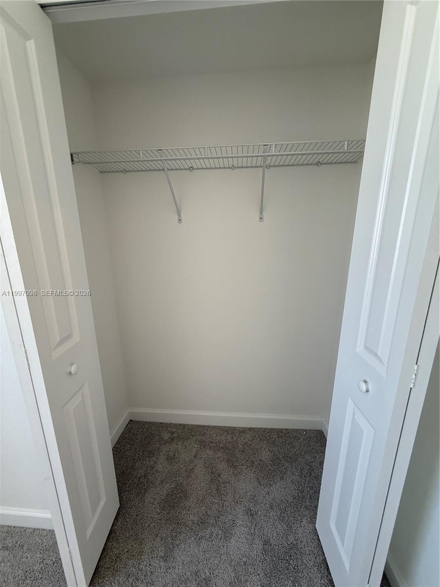 17907 Southwest 356th Street, Unit 17907 Homestead, FL 33034 - Photo 10 of 14 a view of closet