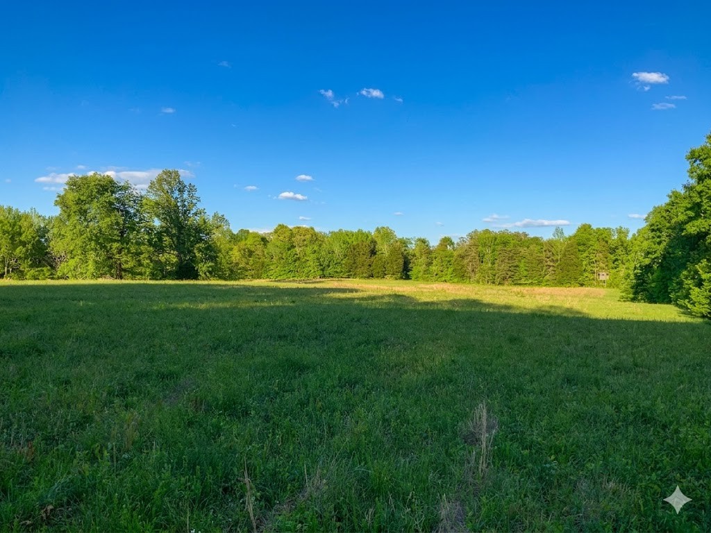 0 Upper Standing Rock Road Dover, TN 37058 - Photo 69 of 76 a view of a golf course with a lake