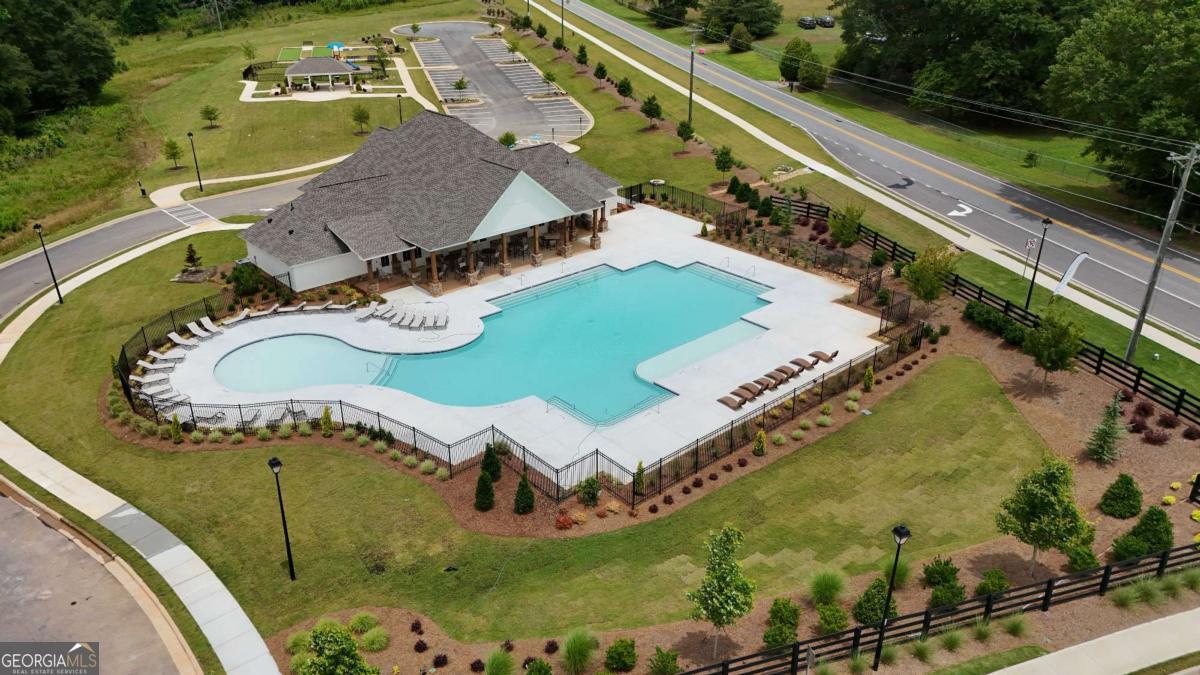 494 Otway Loop Winder, GA 30620 - Photo 15 of 17 an aerial view of a house with a garden and lake view