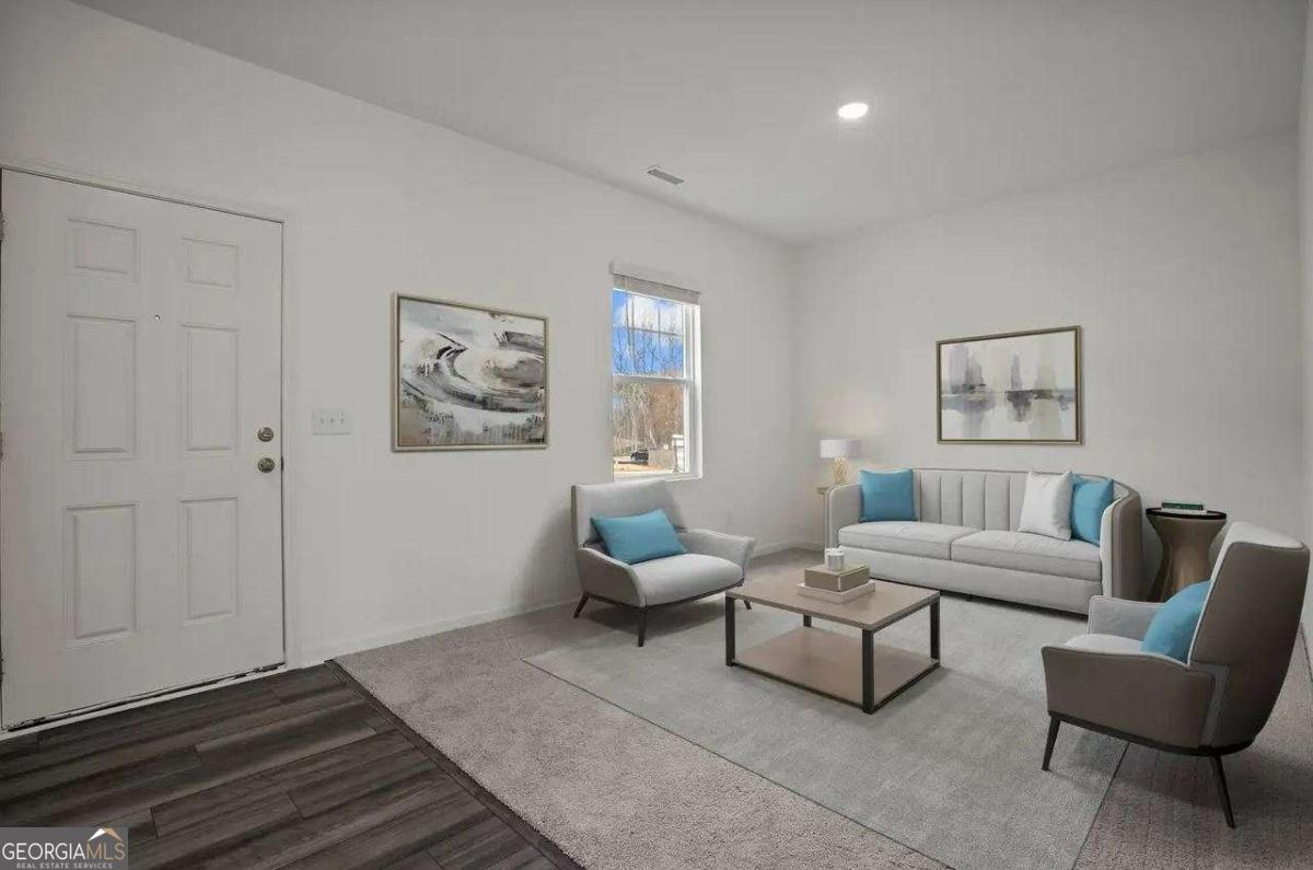 494 Otway Loop Winder, GA 30620 - Photo 6 of 17 a living room with furniture and wall paintings