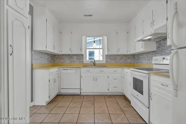 $995,000 | 1207 North Topsail Drive, Surf City, NC 28445