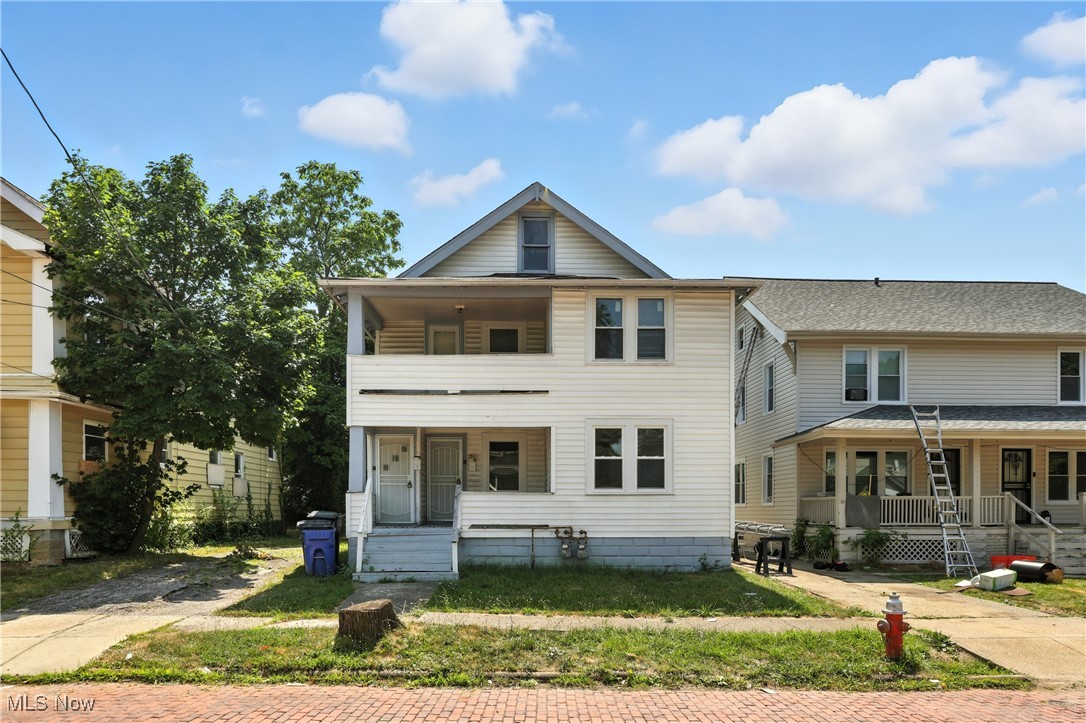 1774 Urbana Road Cleveland, OH 44112 - Photo 2 of 41 View of front of property featuring covered porch