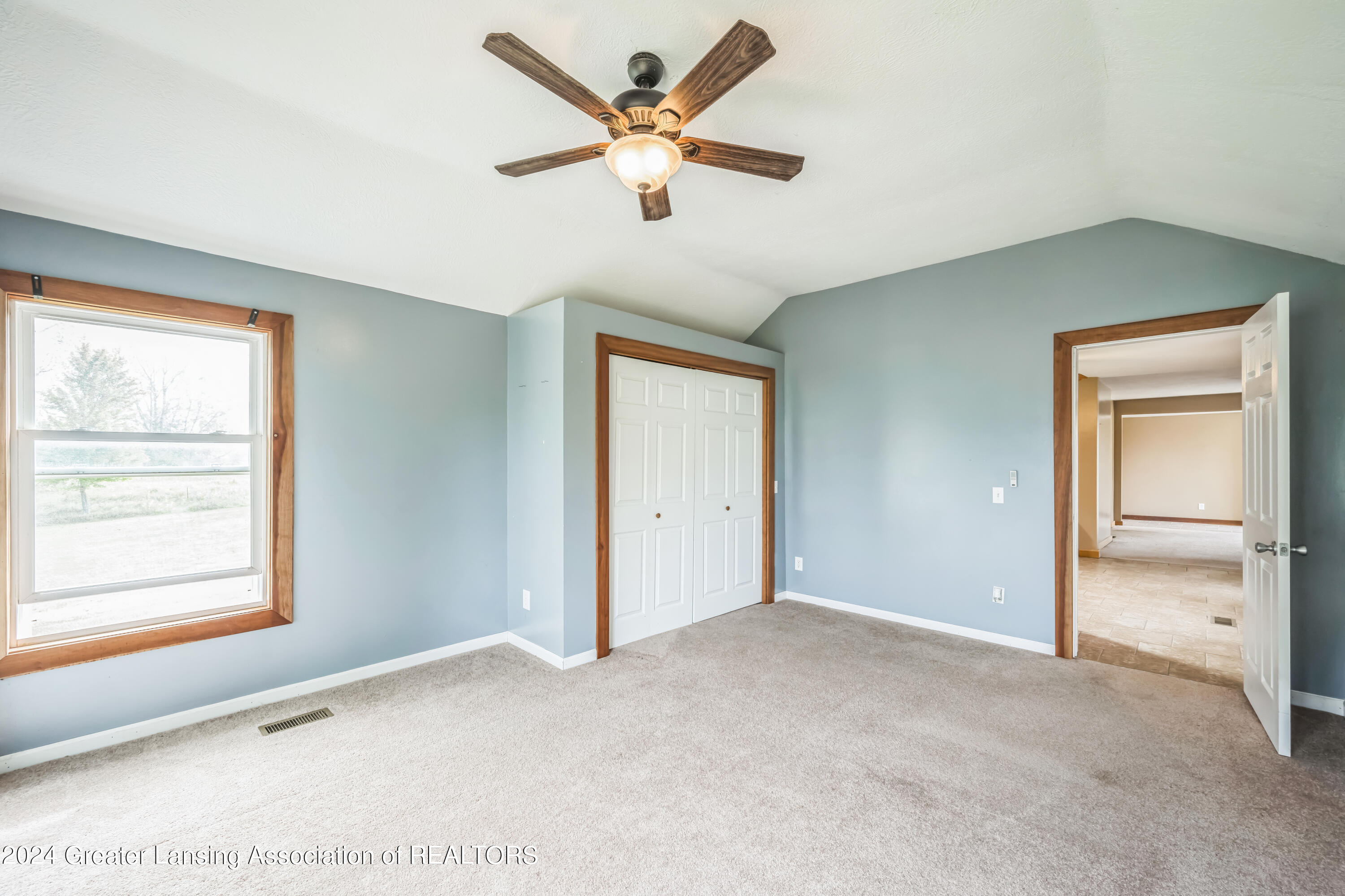 712 West Barnes Road Mason, MI 48854 - Photo 19 of 22 1st Floor Bedroom