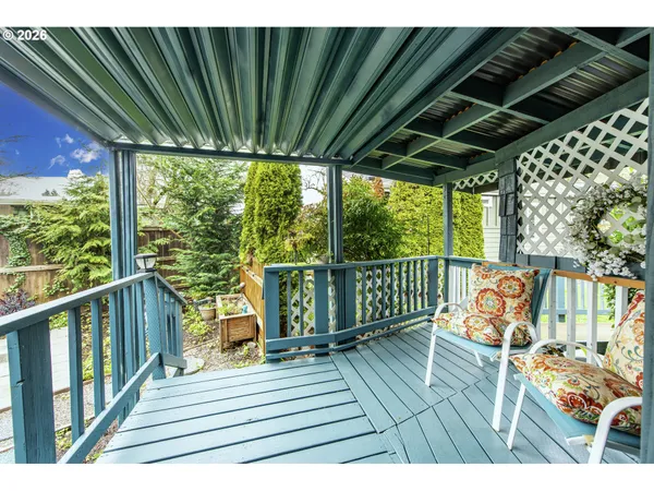 a balcony with wooden floor