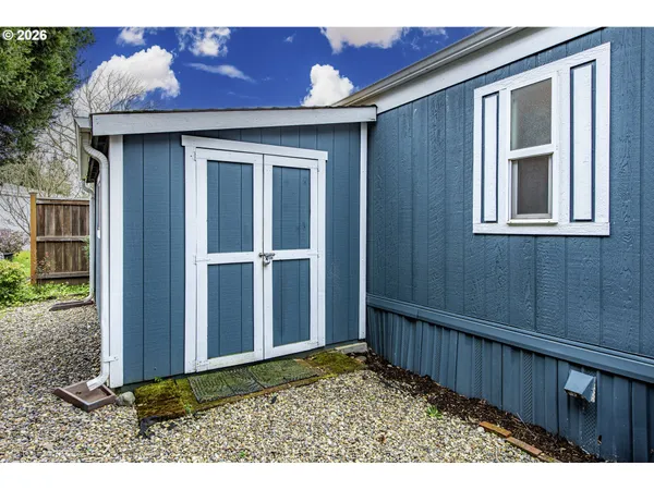 a view of backyard with cabin