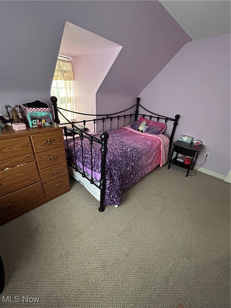 2113 Stabler Road Akron, OH 44313 - Photo 24 of 39 Carpeted bedroom featuring lofted ceiling