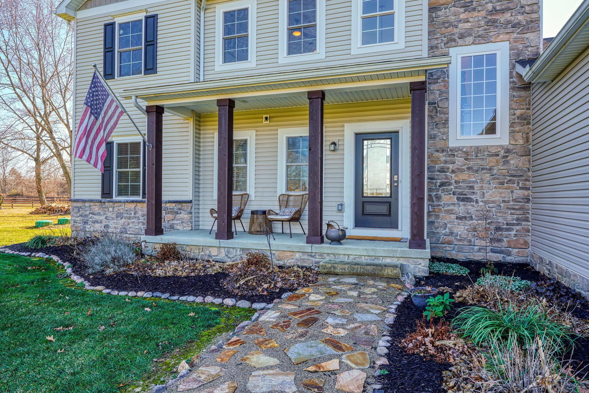 8050 Kilbourne Road Sunbury, OH 43074 - Photo 4 of 56 Charming Lemonade Porch