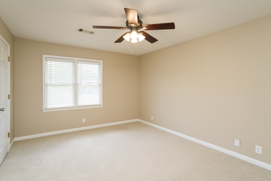 711 Kent Road Nashville, TN 37214 - Photo 15 of 31 an empty room with a window and a ceiling fan