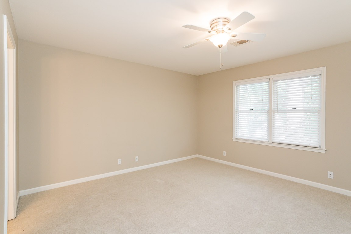 711 Kent Road Nashville, TN 37214 - Photo 21 of 31 an empty room with a window and a fan
