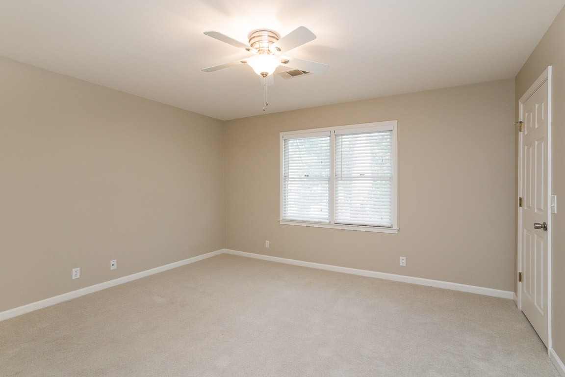 711 Kent Road Nashville, TN 37214 - Photo 22 of 31 an empty room with a window and a fan