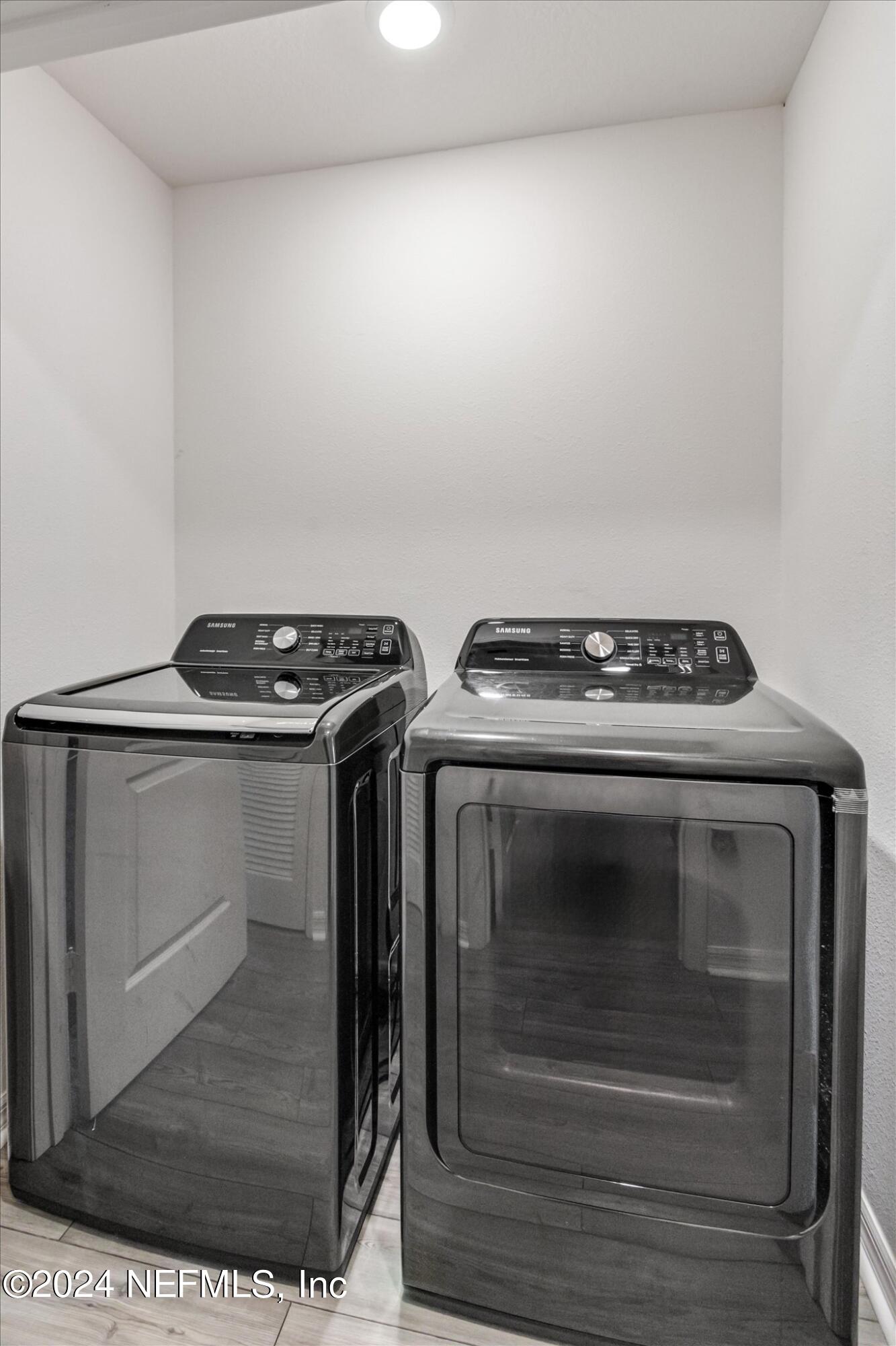 3 Pinwheel Lane Palm Coast, FL 32164 - Photo 15 of 20 a view of washer and dryer