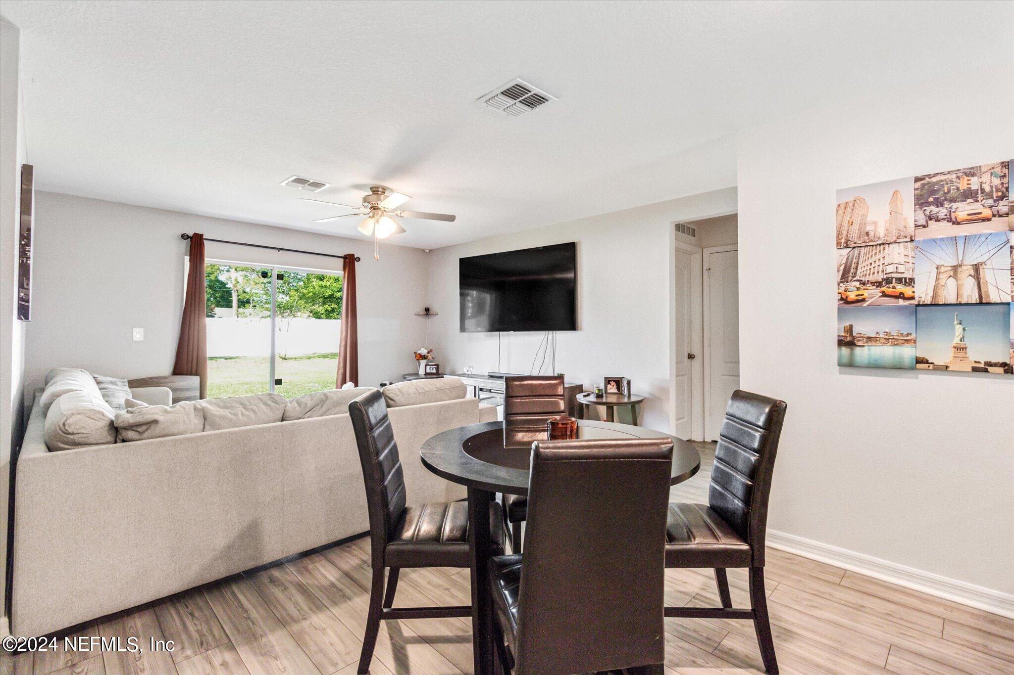 3 Pinwheel Lane Palm Coast, FL 32164 - Photo 5 of 20 a dining room with furniture and window
