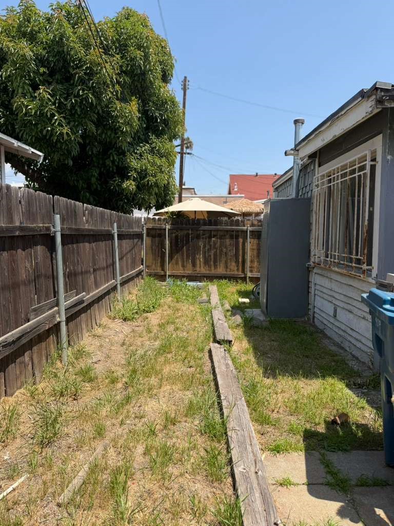 309 Alhambra Road Alhambra, CA 91801 - Photo 7 of 10 a view of a house with backyard and sitting area