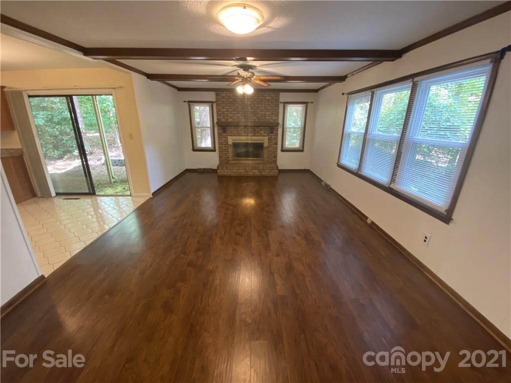 6205 Coldwater Court Raleigh, NC 27612 - Photo 2 of 16 a view of gallery with wooden floor